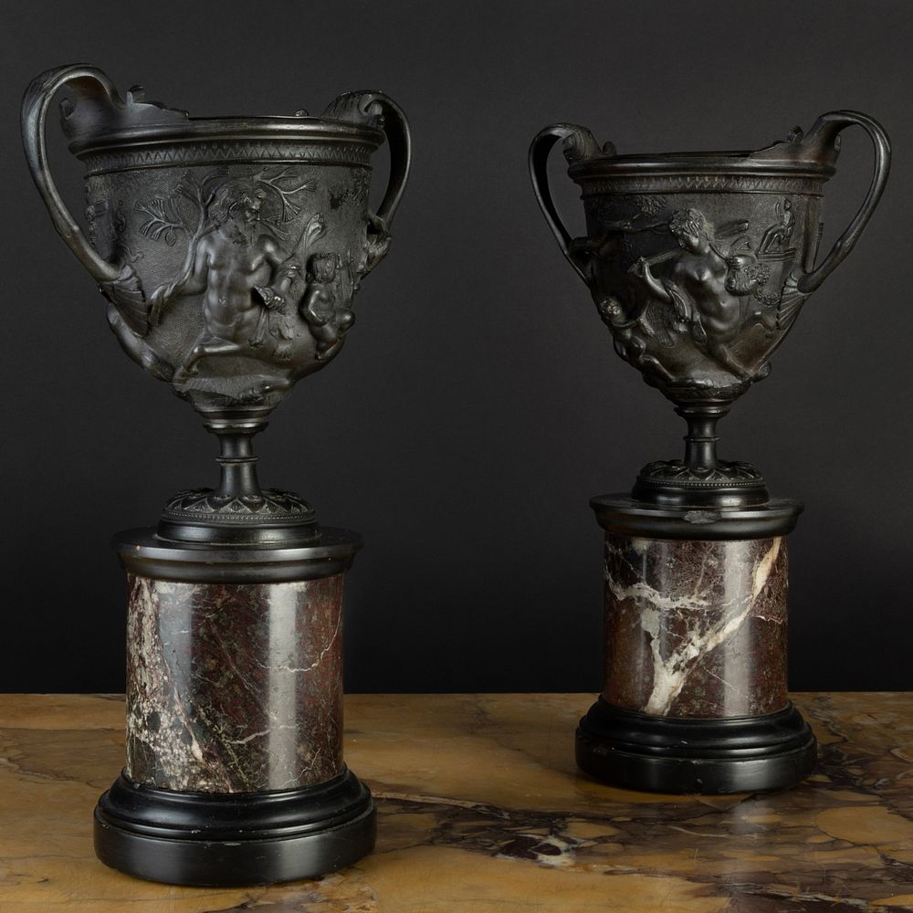 Appraisal: Pair of Two-Handled Bronze Urns on Marble Bases x x