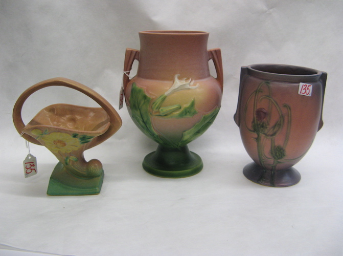 Appraisal: THREE ROSEVILLE AMERICAN ART POTTERY VASES a Futura pattern Mauve