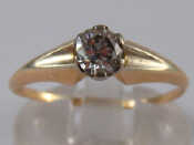 Appraisal: A yellow metal tests carat gold diamond solitaire ring estimated