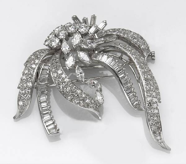 Appraisal: A diamond and platinum spray brooch estimated total diamond weight