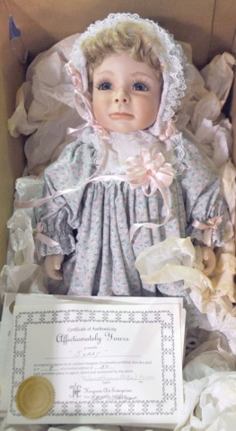 Appraisal: Collectible Doll by Mitzie Hargrave Sorry Porcelain head hands and