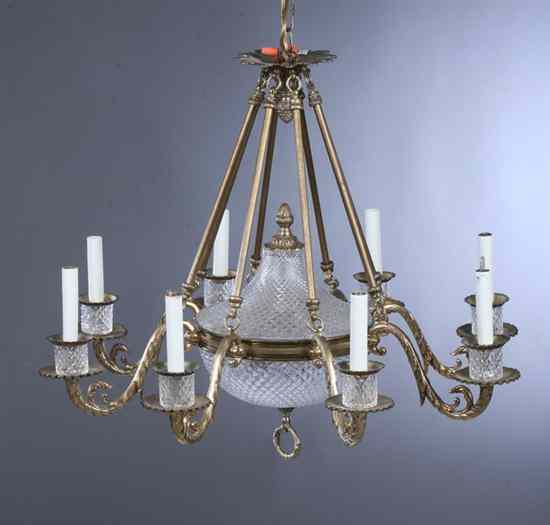 Appraisal: GEORGIAN STYLE GILT-METAL AND CUT-CRYSTAL EIGHT-LIGHT CHANDELIER Shaped baluster-form cut