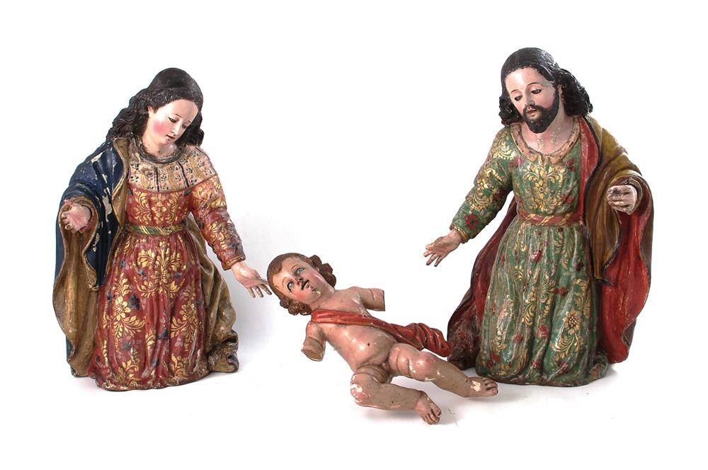 Appraisal: Spanish Colonial paint-decorated carved nativity probably circa - each finely