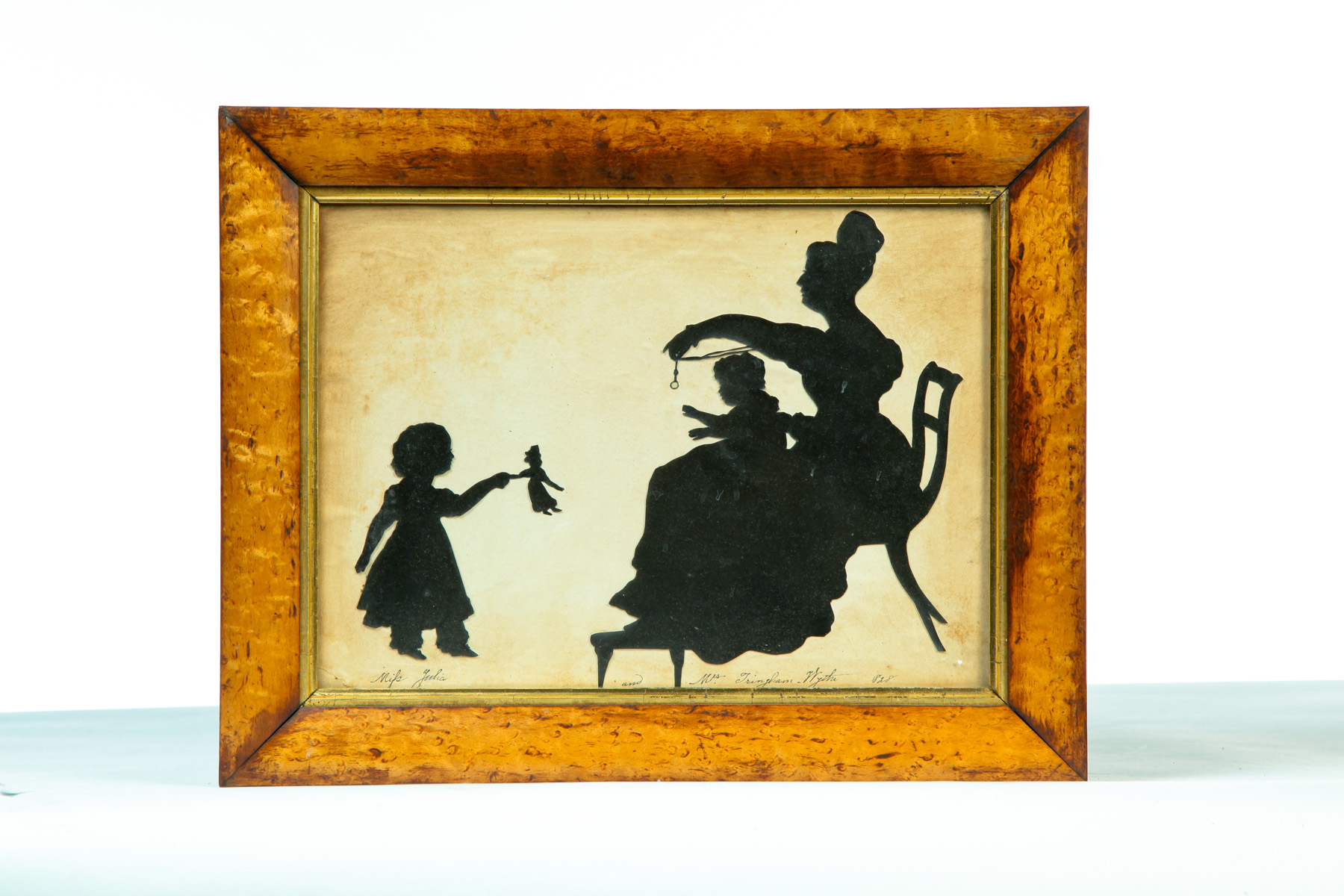 Appraisal: CUT SILHOUETTE OF FAMILY GROUP America dated Mother entertaining two