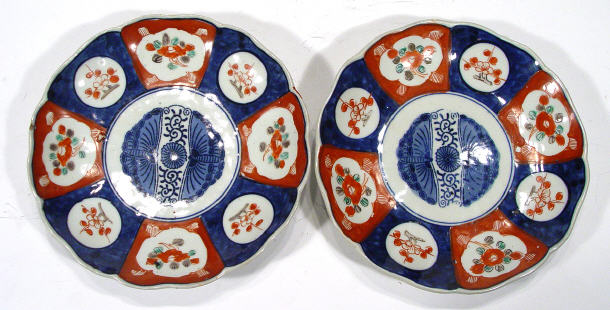 Appraisal: Pair of Japanese Imari fluted porcelain plates with hand painted