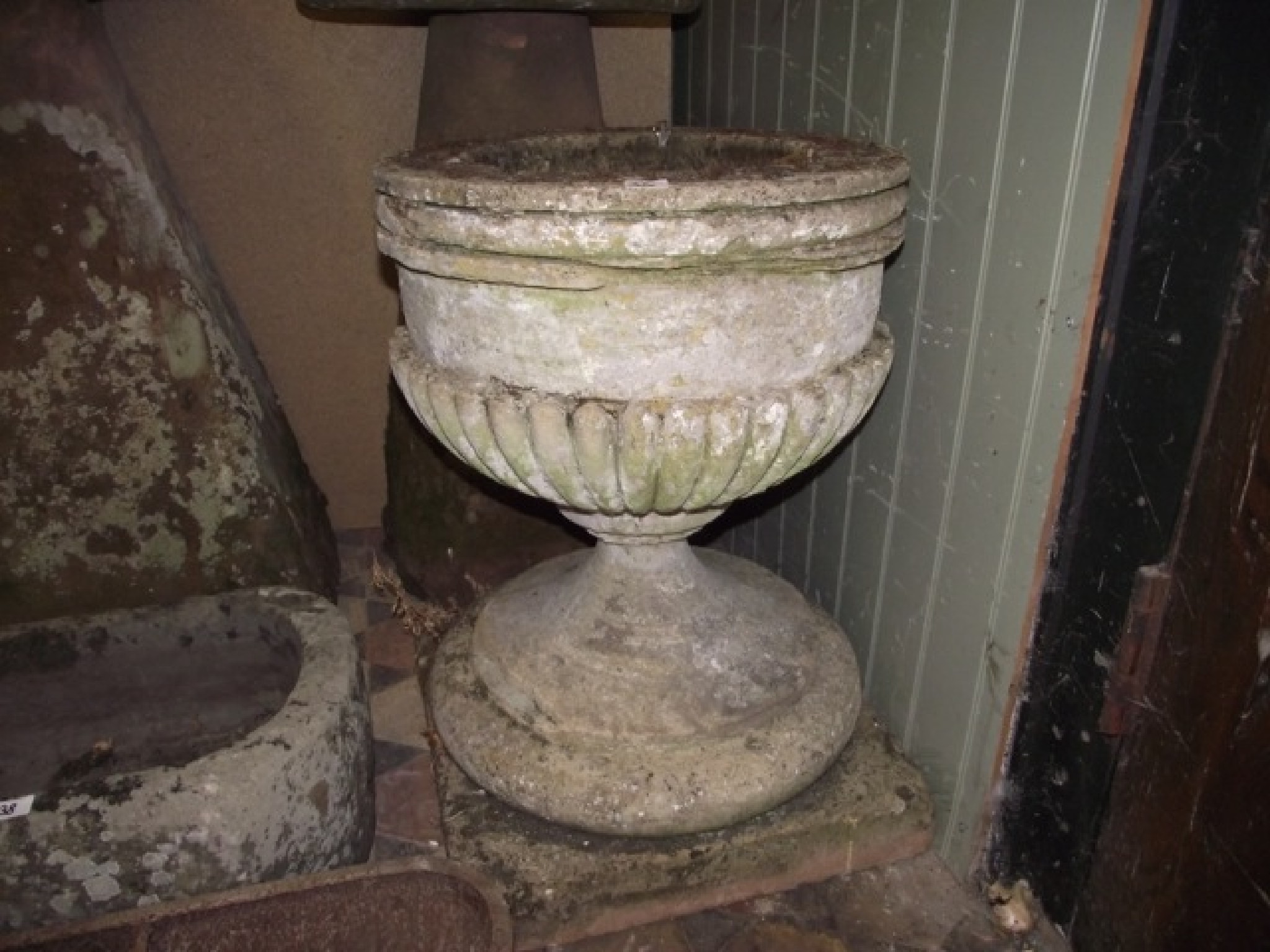 Appraisal: A th century or possibly earlier stone font urn the