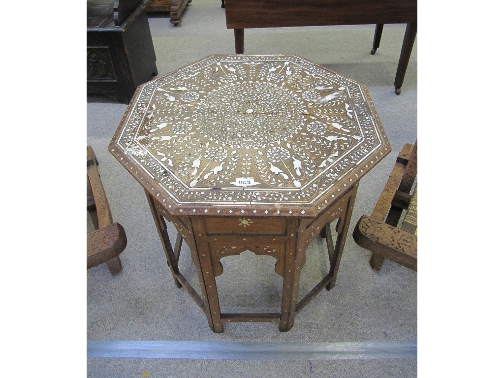 Appraisal: Burmese bone inlaid octagonal table on folding stand