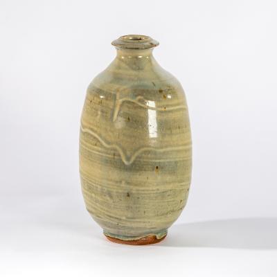 Appraisal: Paul Barron British - a celadon glaze bottle vase of