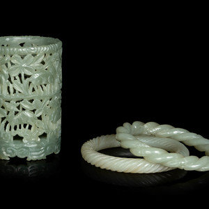 Appraisal: Three Chinese Carved Celadon Jade Articles comprising two bangles carved