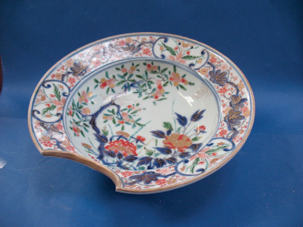 Appraisal: A JAPANESE IMARI BARBERS BOWL decorated in underglaze blue iron