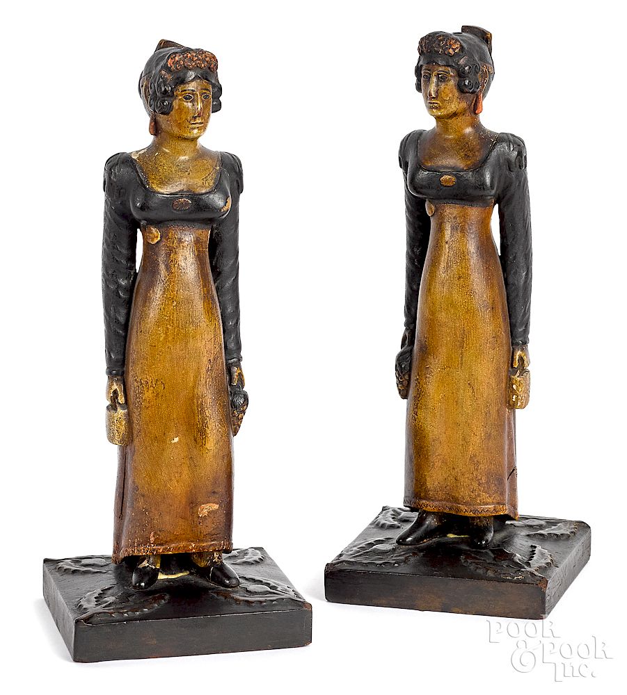 Appraisal: Pair of carved and painted figures of a woman Pair