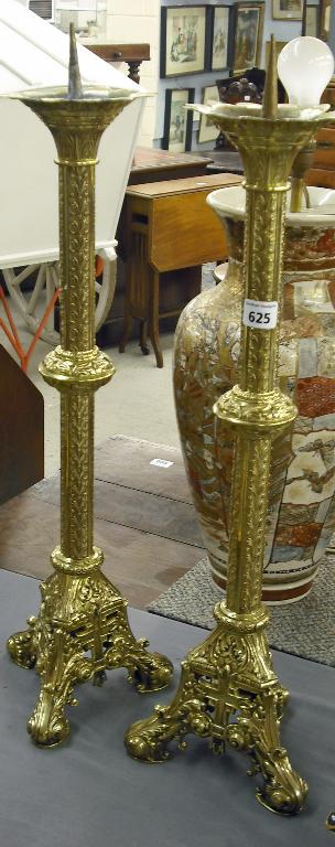 Appraisal: Pair of large decorative Gothic brass pricket candlesticks the knopped