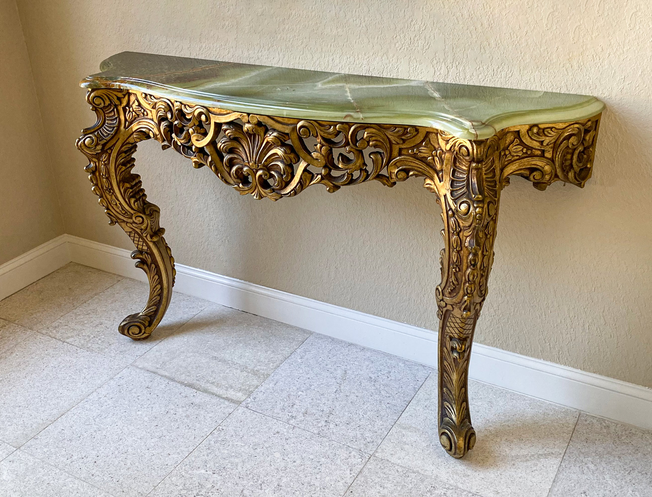 Appraisal: GILT CARVED WOOD MARBLE TOP FOYER TABLE Gilt marble top