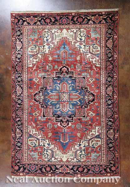 Appraisal: A Fine Persian Serapi Carpet red and camel ground central