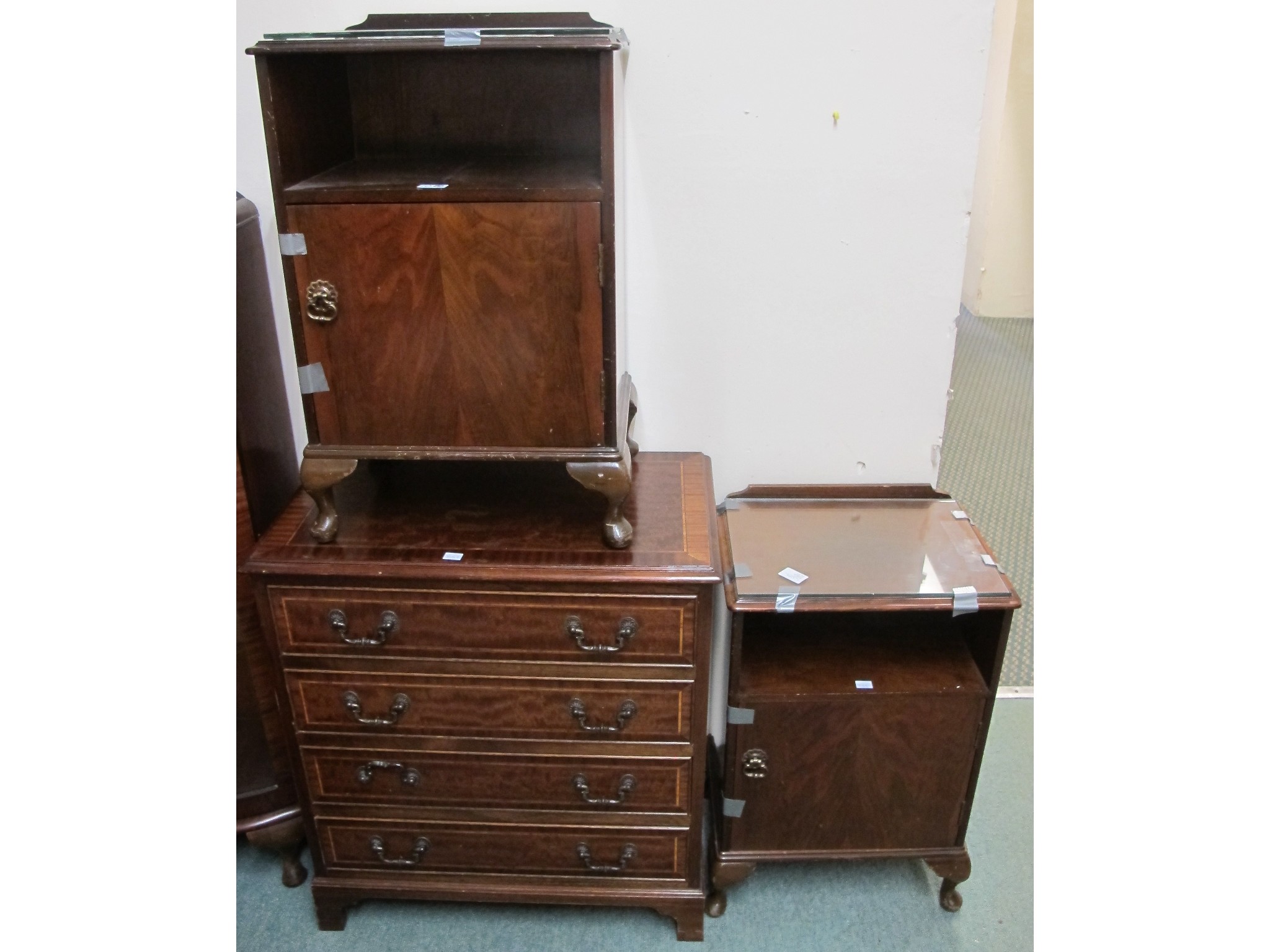 Appraisal: Two bedside cabinets and four drawer inlaid chest of drawers