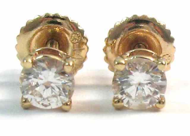 Appraisal: PAIR OF DIAMOND EAR STUDS each k yellow gold set