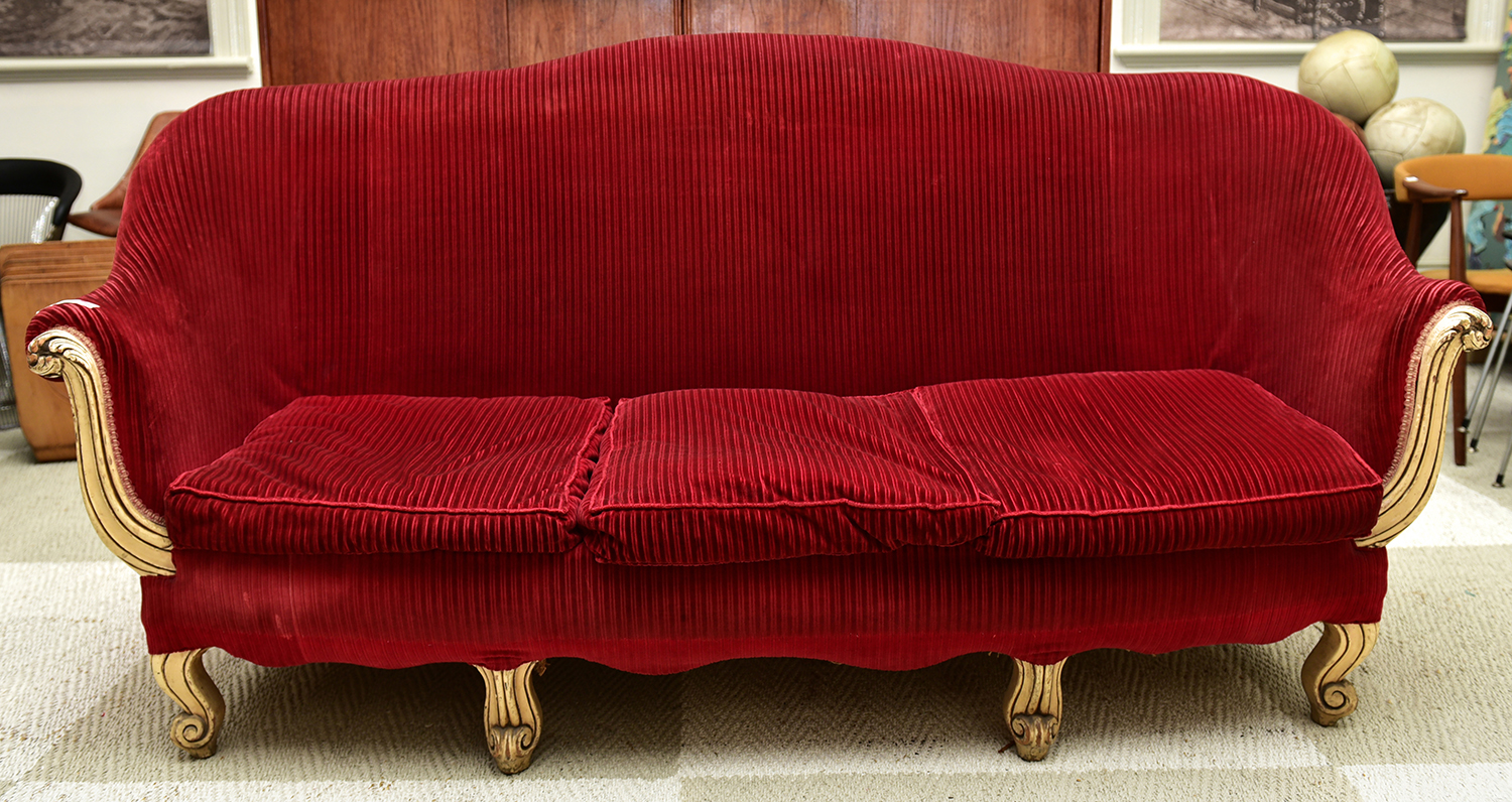 Appraisal: AN ANTIQUE ITALIAN THREE SEAT SETTEE UPHOLSTERED IN BURGUNDY CORDUROY