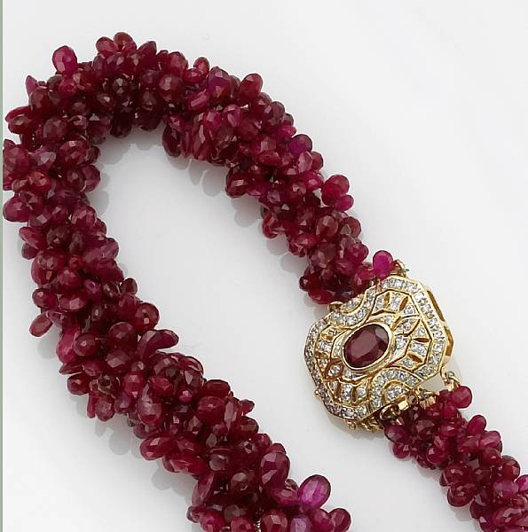 Appraisal: A ruby diamond and fourteen karat gold necklace the torsade