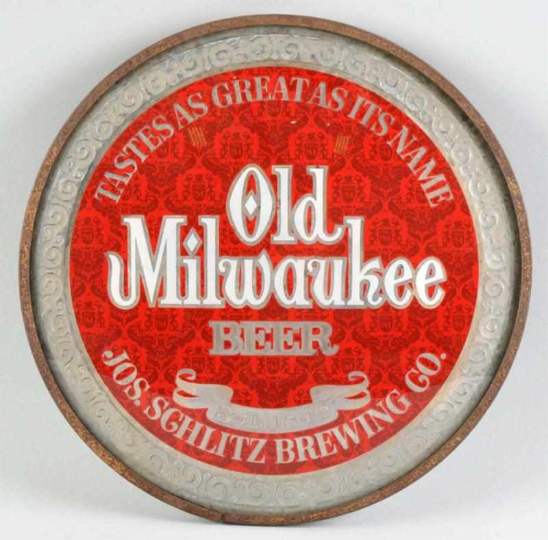 Appraisal: Glass Old Milwaukee Sign Description Circa s Nice design Condition