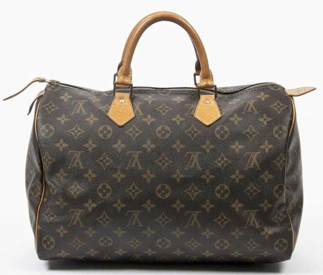 Appraisal: Louis Vuitton Speedy handbag in monogram coated canvas with brass