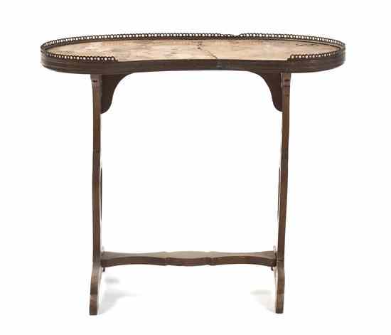 Appraisal: A Louis XVI Style Occasional Table having a three-quarter galleried