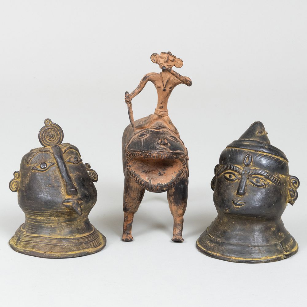 Appraisal: Pair of Ethnographic Metal Busts and a Figure Riding a