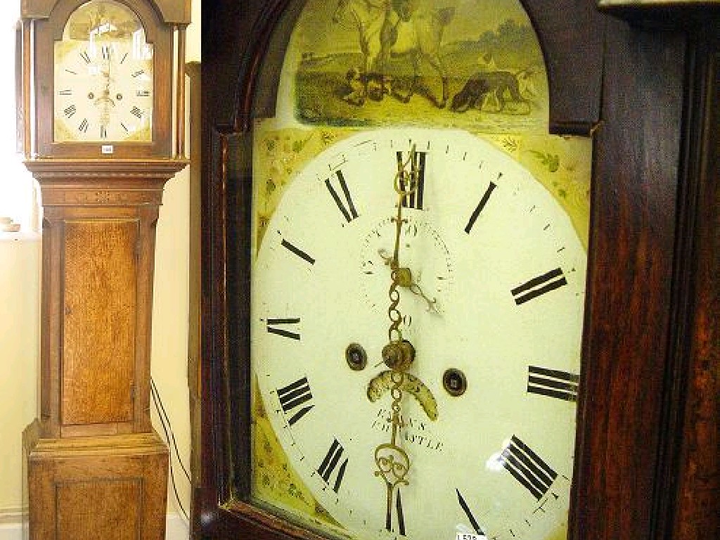 Appraisal: A Georgian oak long case clock the hood enclosing an