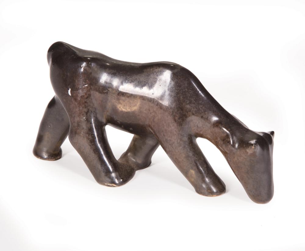 Appraisal: Shearwater Art Pottery Figure of a Grazing Cow marked h