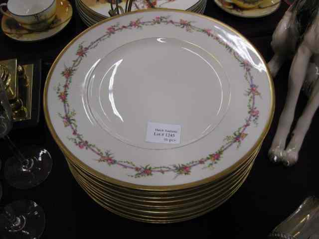 Appraisal: Limoges Porcelain Dinner Plates floral garland gold trim ''