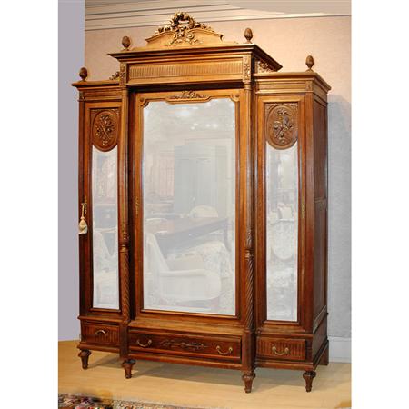 Appraisal: Louis XVI Style Mirrored Door Walnut Armoire Estimate -