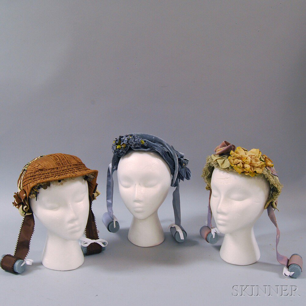 Appraisal: Three Bonnets America - a shirred brown silk bonnet with