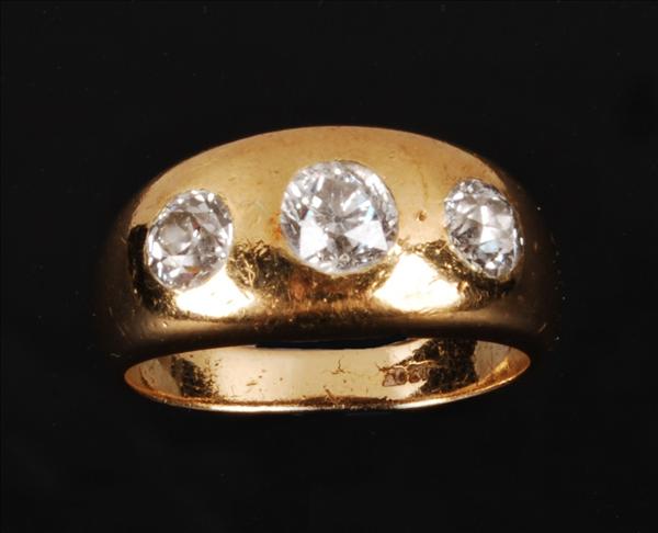 Appraisal: A diamond three stone gipsy ring the slightly graduated old