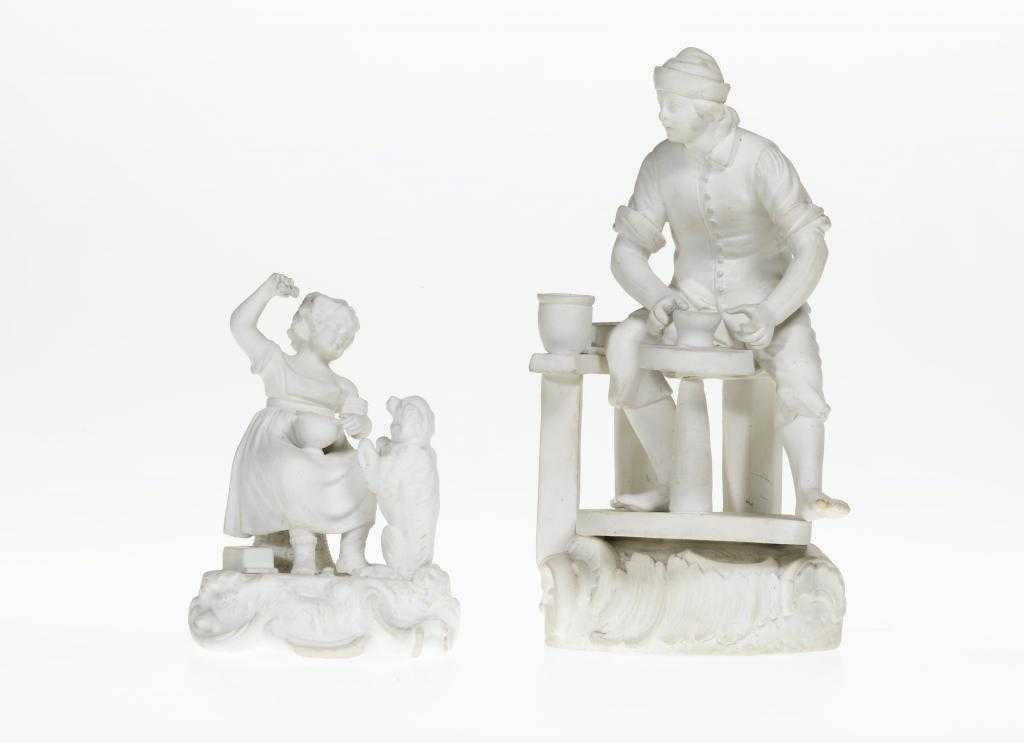 Appraisal: A DERBY BISCUIT FIGURE OF A POTTER seated at his