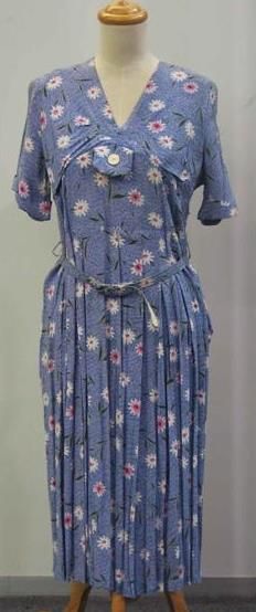 Appraisal: Day dress in floral printed lavender rayon complete with original