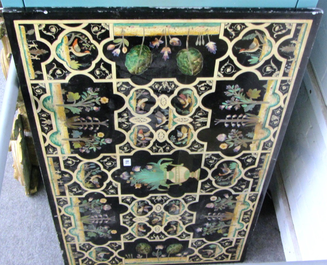 Appraisal: A rectangular scagliola table top decorated with flora fauna and