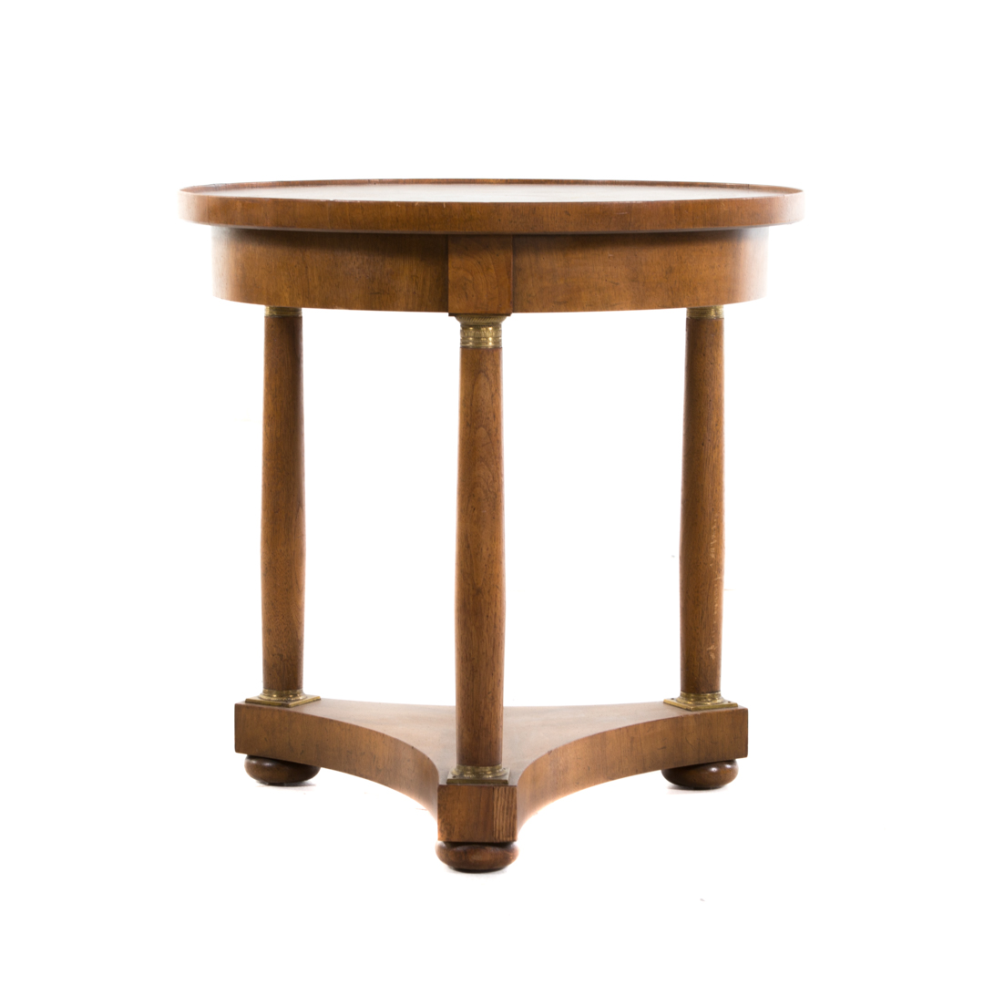 Appraisal: Baker Empire style side table th century round top with