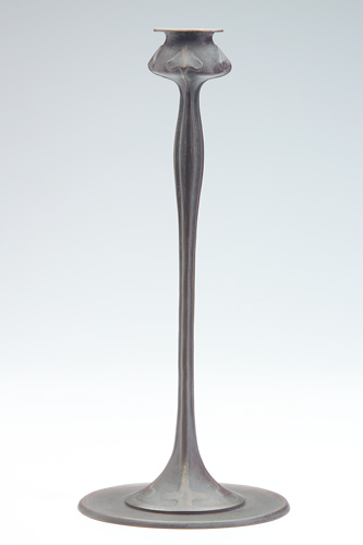 Appraisal: JARVIE Tall candlestick embossed with spade-shaped leaves on long stems