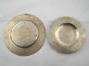 Appraisal: Two white metal tests silver dishes with engraved symbols one