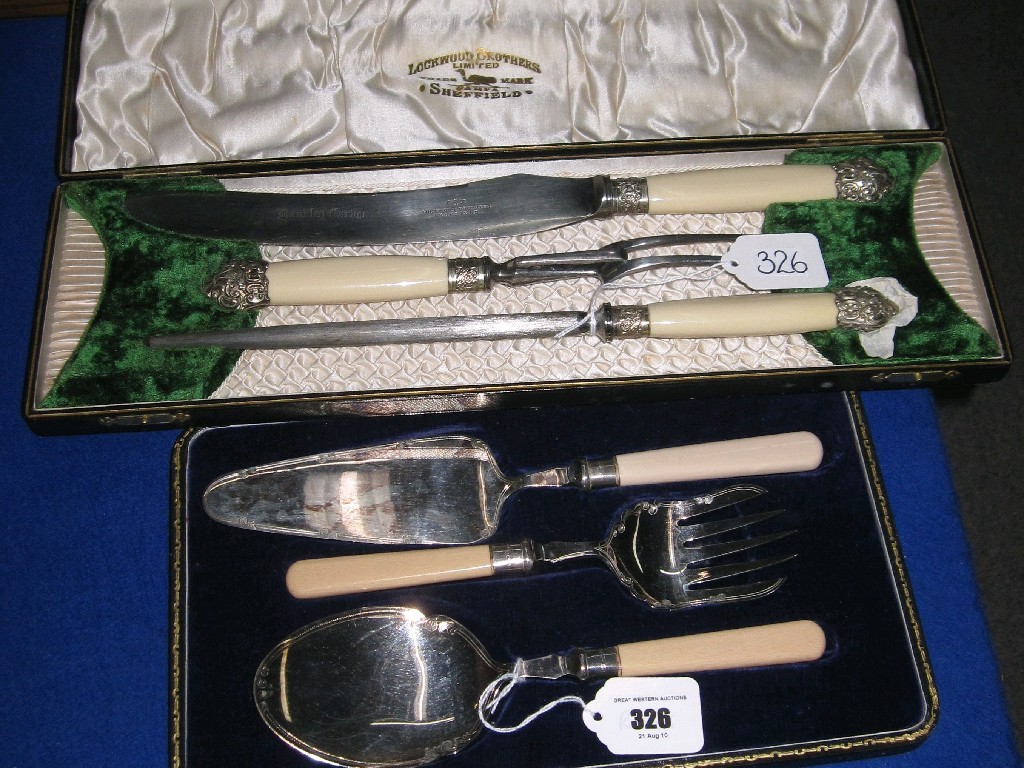 Appraisal: Lot comprising cased three piece carving set and a cased