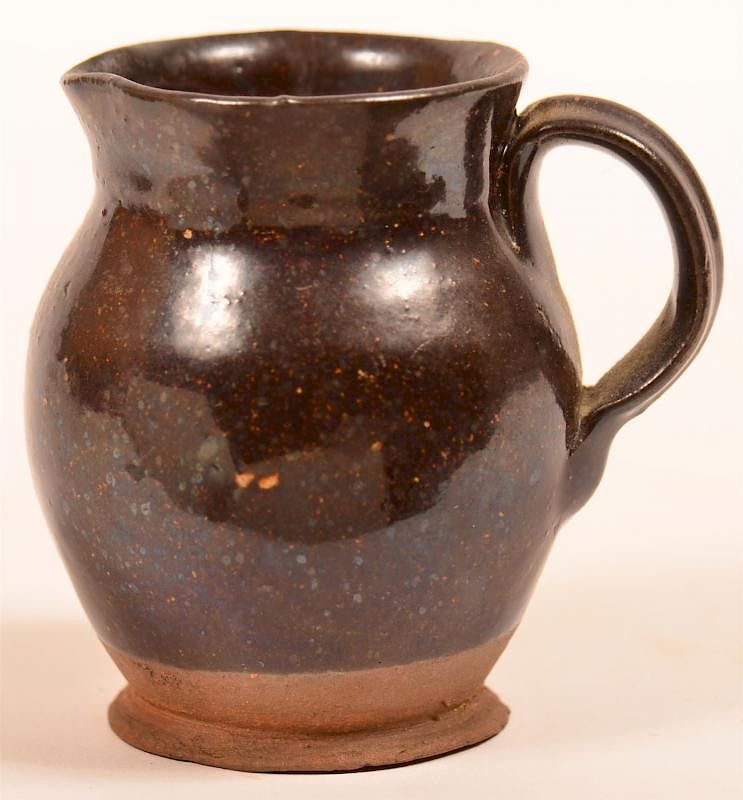 Appraisal: PA Manganese Glazed Miniature Pitcher Pennsylvania th Century Manganese Glazed