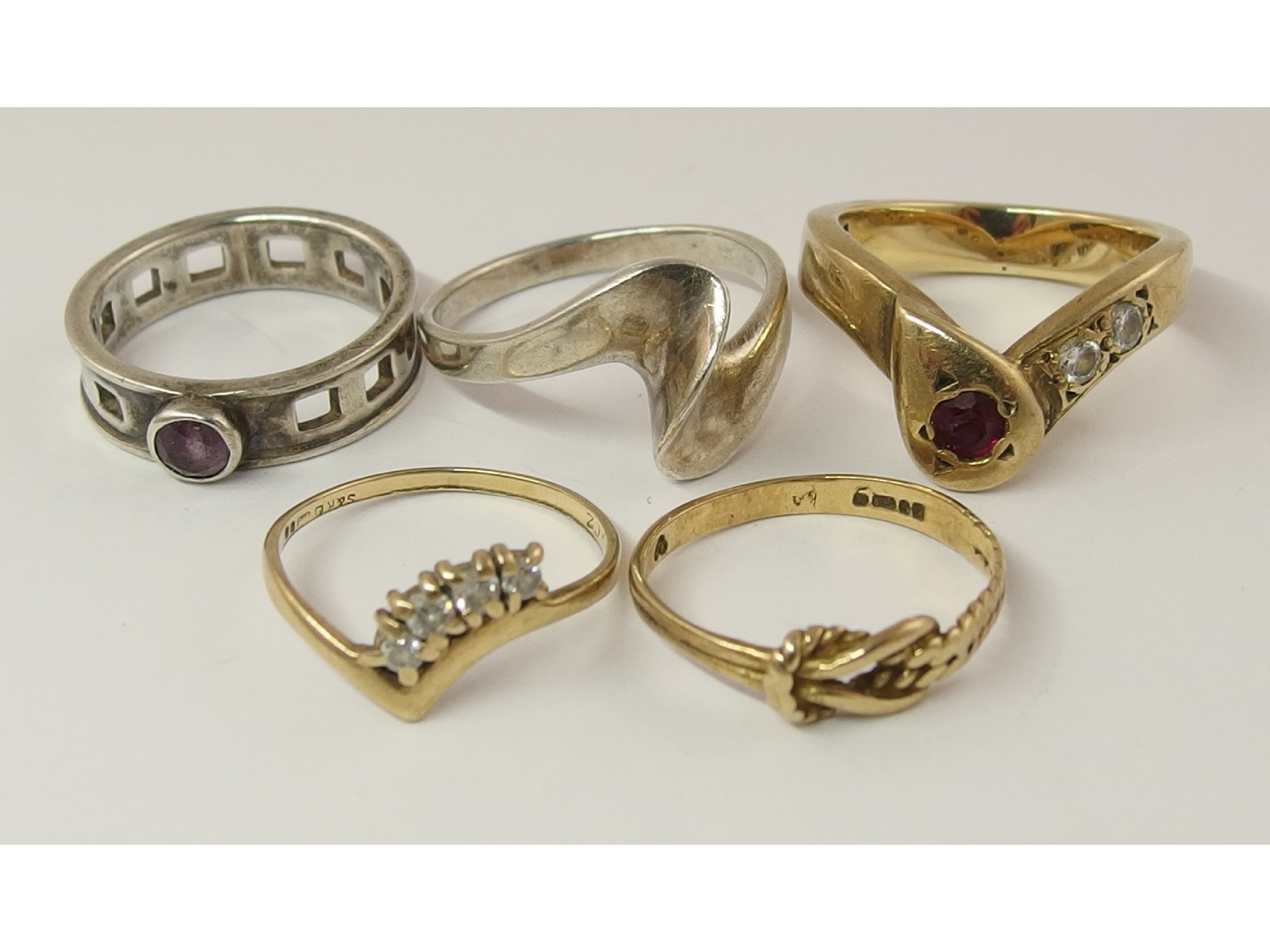 Appraisal: A yellow metal ring set with two diamonds and a