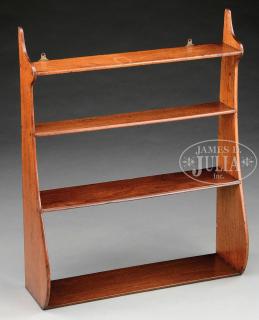 Appraisal: MAHOGANY WHALESIDE SHELF Late th century New England Four fixed