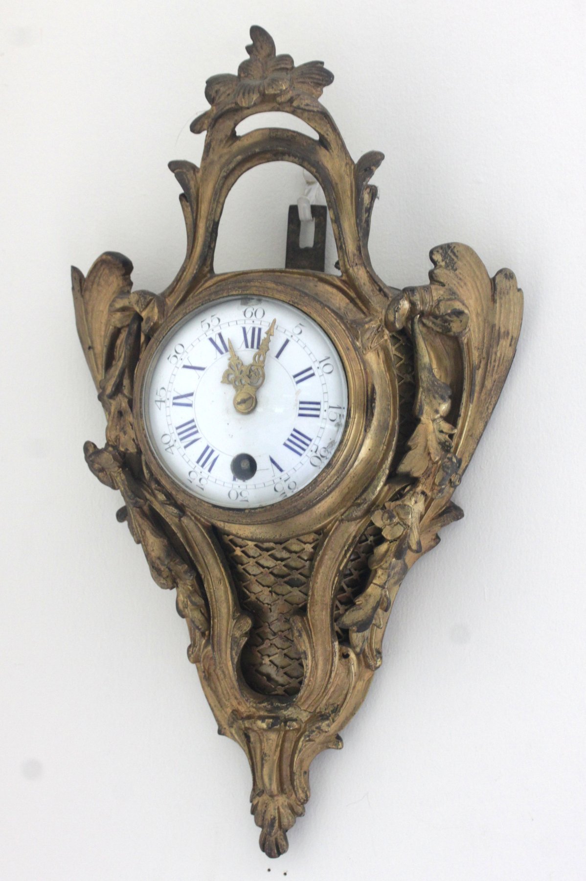 Appraisal: A French gilt metal cartel clock in a rococo case