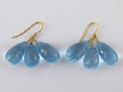 Appraisal: A pair of blue topaz drop earrings with gold fittings