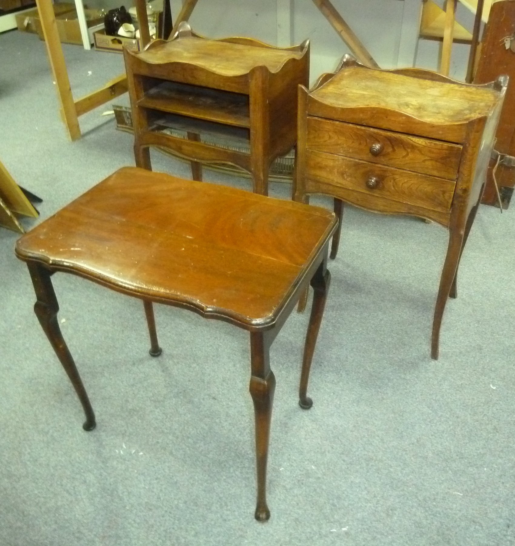 Appraisal: A mahogany two-drawer bedside table another drawers missing and a