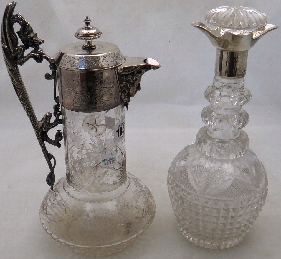 Appraisal: A Victorian silver plated metal mounted glass claret jug the