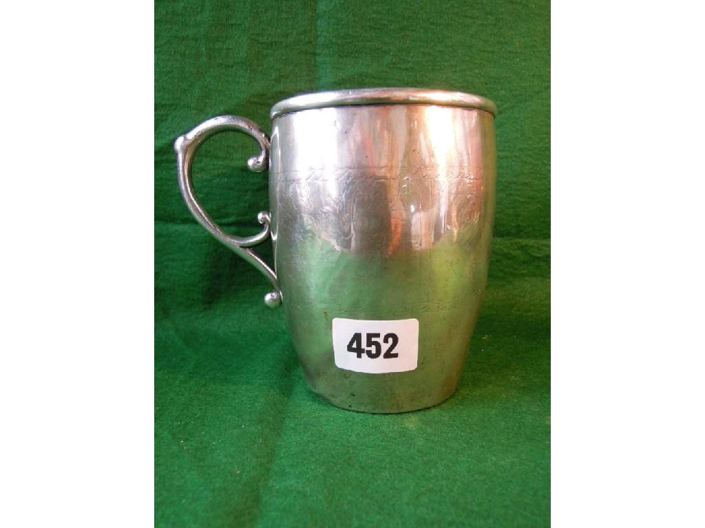 Appraisal: A continental white metal tankard with simple scratch detail and