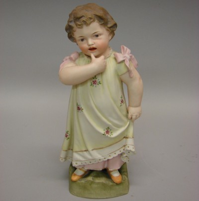 Appraisal: Unmarked bisque figurine of standing female child Child is standing