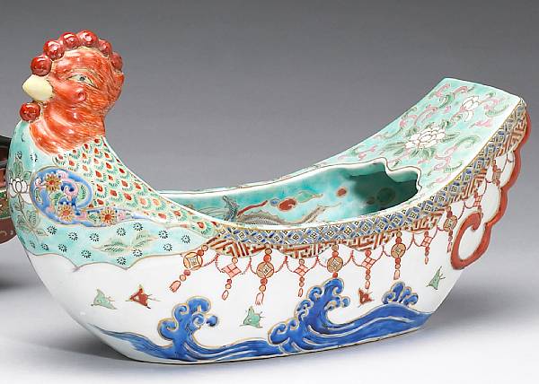 Appraisal: A polychrome enameled boat-shaped porcelain vase Meiji Taisho Period Its