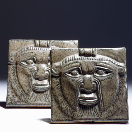 Appraisal: FULPER Pair of Vasekraft bookends modeled with Aztec masks and